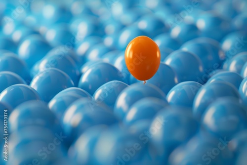 A single orange balloon stands out among a crowd of blue balloons.