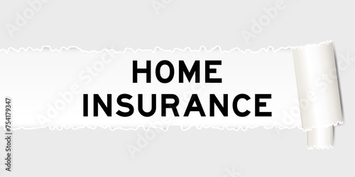 Ripped gray paper background that have word home insurance under torn part