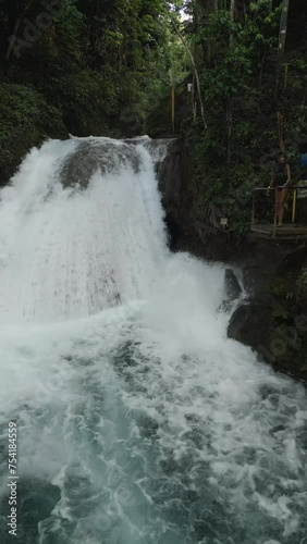 Dunn River Falls with lush vegetation in Ocho Rios on the tropical island of Jamaica. photo
