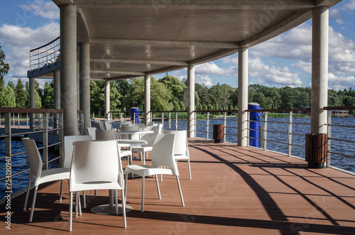 HOLIDAYS BY THE LAKE - Sunny hot day on the pier photo