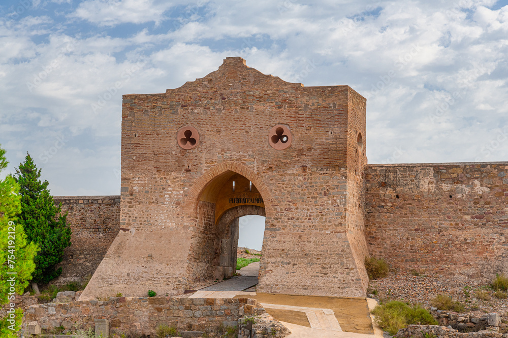Sagunt, Valencia - Spain - View of the castle in Sagunt, showcasing thick walls, a large gate, partially ruined buildings and foundations