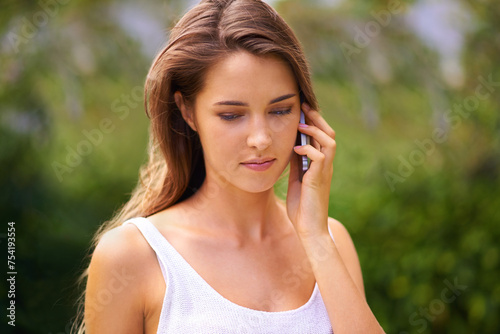 Phone call, woman and communication at park in nature for conversation, discussion or networking outdoor. Person, smartphone or talking in garden of home with internet, relax or mobile chat in summer