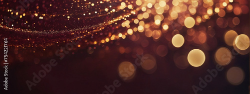 Deep maroon rays with golden sparkles and bokeh lights.