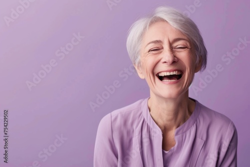 An image that captures the essence of joy as a mature woman laughs heartily, her youthful spirit shining through the Kidcore themed lilac backdrop.