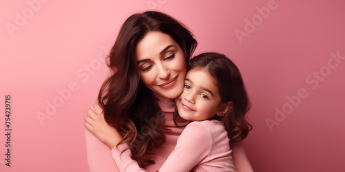 Mother and little kid daughter isolated on pink background, Mother's Day love family parenthood childhood concept, Portrait of mother with daughter