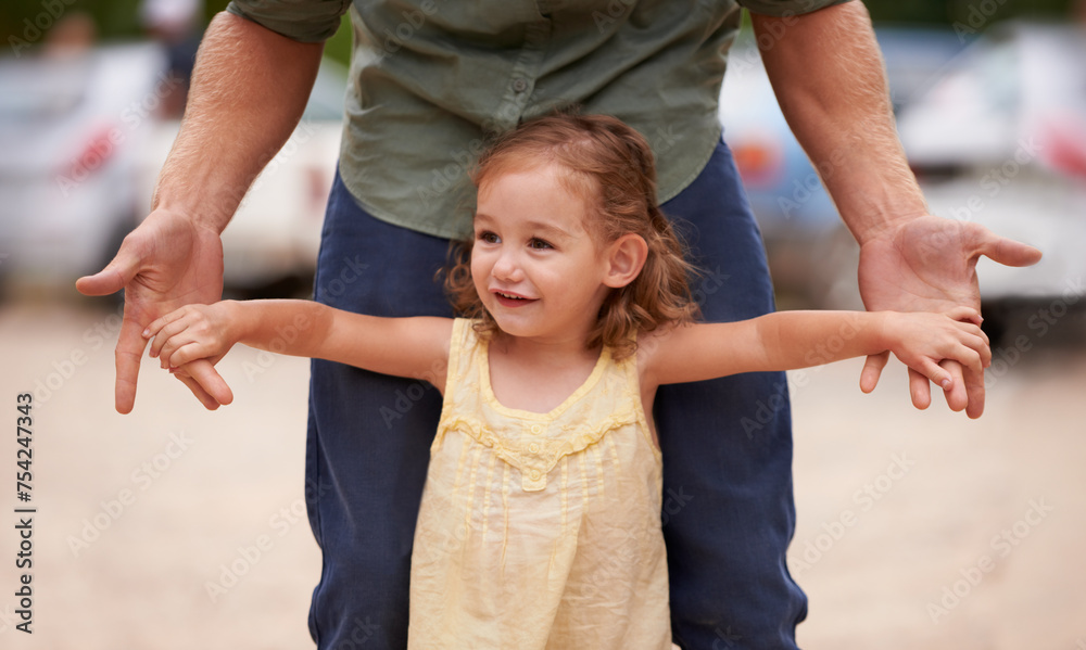 Fototapeta premium Father, child and hand holding for nature holiday for bonding love support with parent development, trust or connection. Male person, daughter and together for dad adventure, happiness or playing