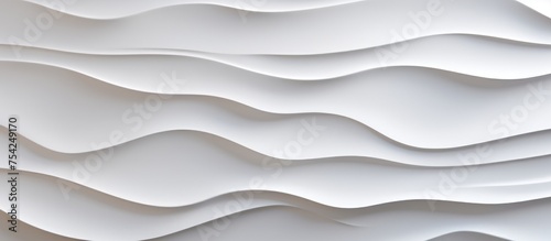 This close-up shot showcases a white wall with intricate wavy lines, creating a unique and visually interesting texture. The lines are smooth and dynamic,