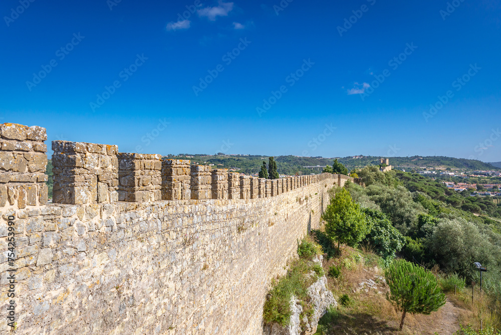 Castle wall and tower in Obidos town, Oeste region, Leiria District of Portugal