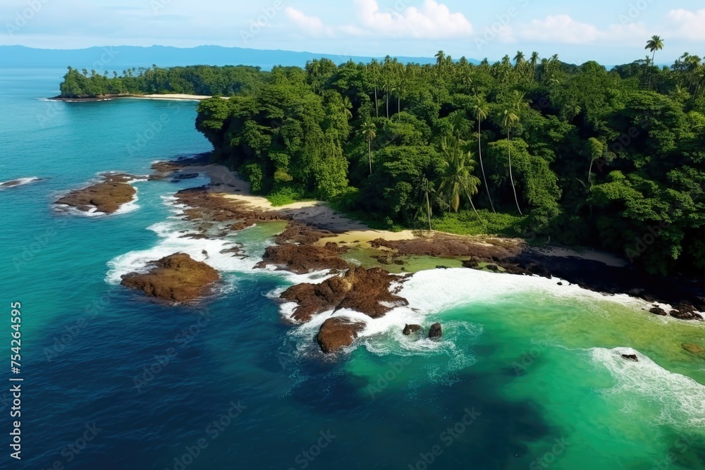 Aerial view of a beach and forested area. Suitable for travel and nature concepts