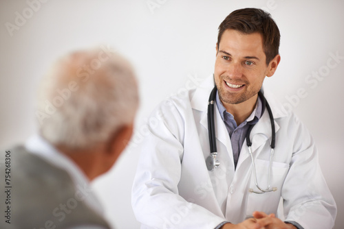 Elderly, man and doctor consultation or healthcare discussion in retirement or life insurance, hospital or cardiology. Male person, back and advice or diagnosis good news, rehabilitation or treatment