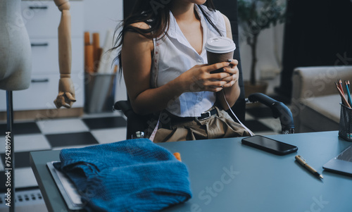 Young woman small business owner working at home office. Online marketing packaging delivery, startup SME entrepreneur or freelance woman concept. Small business owener photo