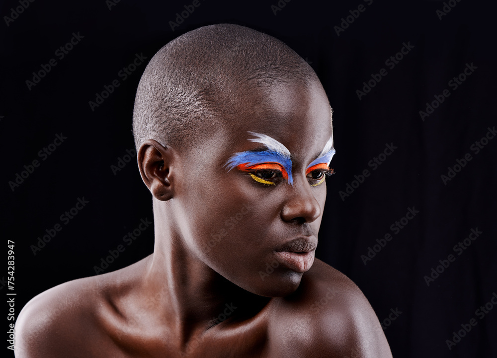 African model, makeup and eyeshadow with beauty, skin and creative with studio and color. Woman, closeup and face paint for artistic, contrast and aesthetic for glamour isolated on black background African model, makeup and eyeshadow with beauty, skin and creative with studio and color. Woman, closeup and face paint for artistic, contrast and aesthetic for glamour isolated on black background