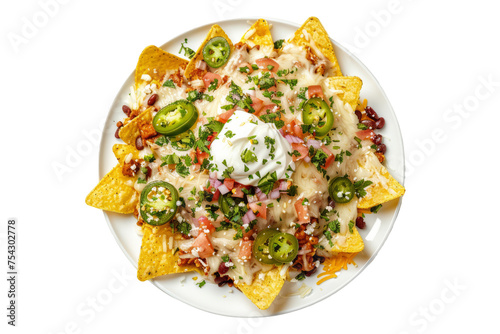 cheese nachos with toppings such as beans, jalapeno and sour cream, on a white plate