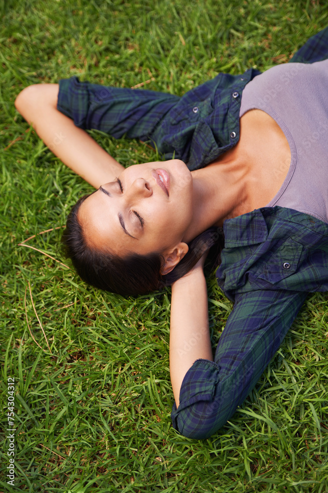 Relax, nature and woman on grass with eyes close for peace, satisfaction and good mood in outdoor park. Spring, green lawn and face of female person with happiness for rest, enjoyment and wellness Relax, nature and woman on grass with eyes close for peace, satisfaction and good mood in outdoor park. Spring, green lawn and face of female person with happiness for rest, enjoyment and wellness