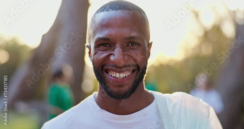 Black man, student and smile for volunteer work in outdoor with plastic for community service on earth day. Male person, charity support and happy for skill development on university break in forest photo