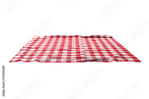 Red and white checkered picnic blanket on wooden table