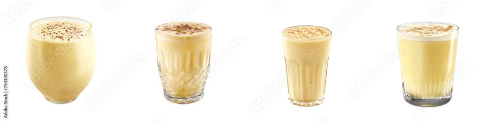 Four different styles of glassware each filled with a frothy, creamy smoothie sprinkled with a topping. Their yellow hues suggest a blend of banana or mango, inviting a refreshing taste.