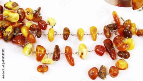 Different jewelry from natural amber on white backgroundN photo