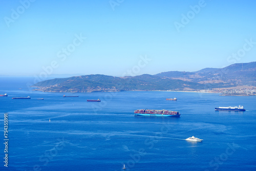 Merchandise ships at sea, arriving at port © Bela Art