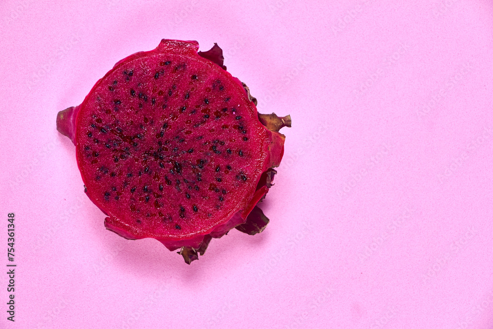 Red dragon fruit Set with appetizing serving on pink background. Top view Red dragon fruit Set with appetizing serving on pink background. Top view