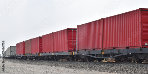 Cargo container on freight train ready to leave the station.
