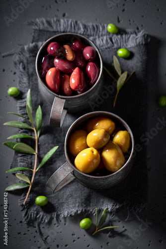 Green and ripe olives with ...