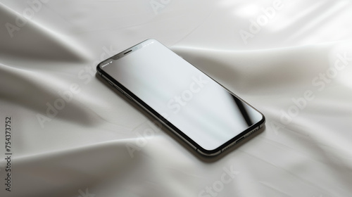 product photo of a sleek smartphone placed vertically, isolated on a white fabric background