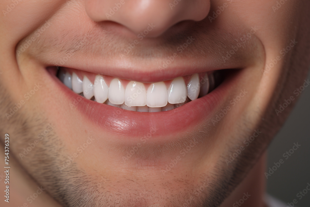Fototapeta premium a man smiles with his teeth showing сreated with Generative Ai