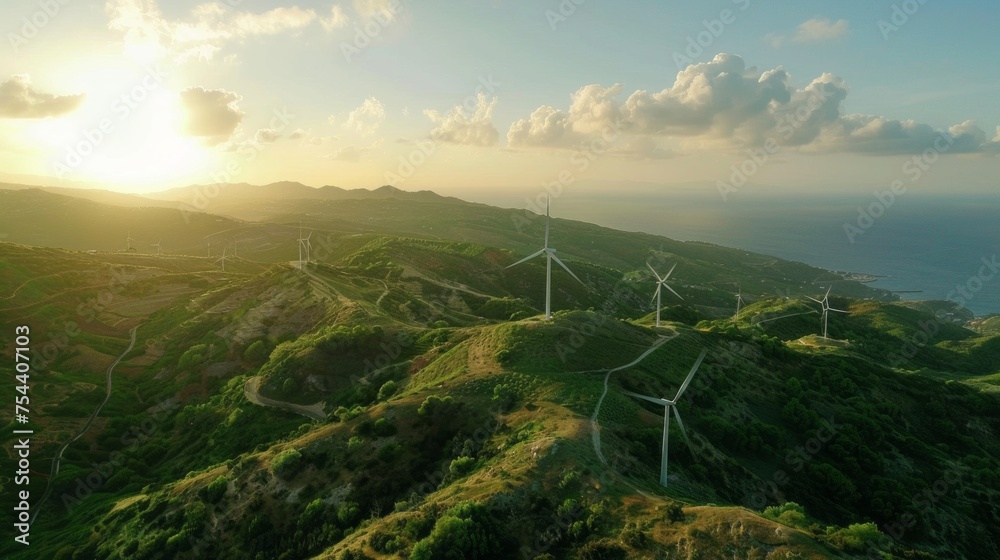 Wind turbines stand atop lush green hills with a panoramic view of the coast and sea, symbolizing sustainable energy generation. copy space Wind turbines stand atop lush green hills with a panoramic view of the coast and sea, symbolizing sustainable energy generation. copy space