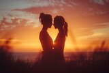 Romantic couple embracing at sunset