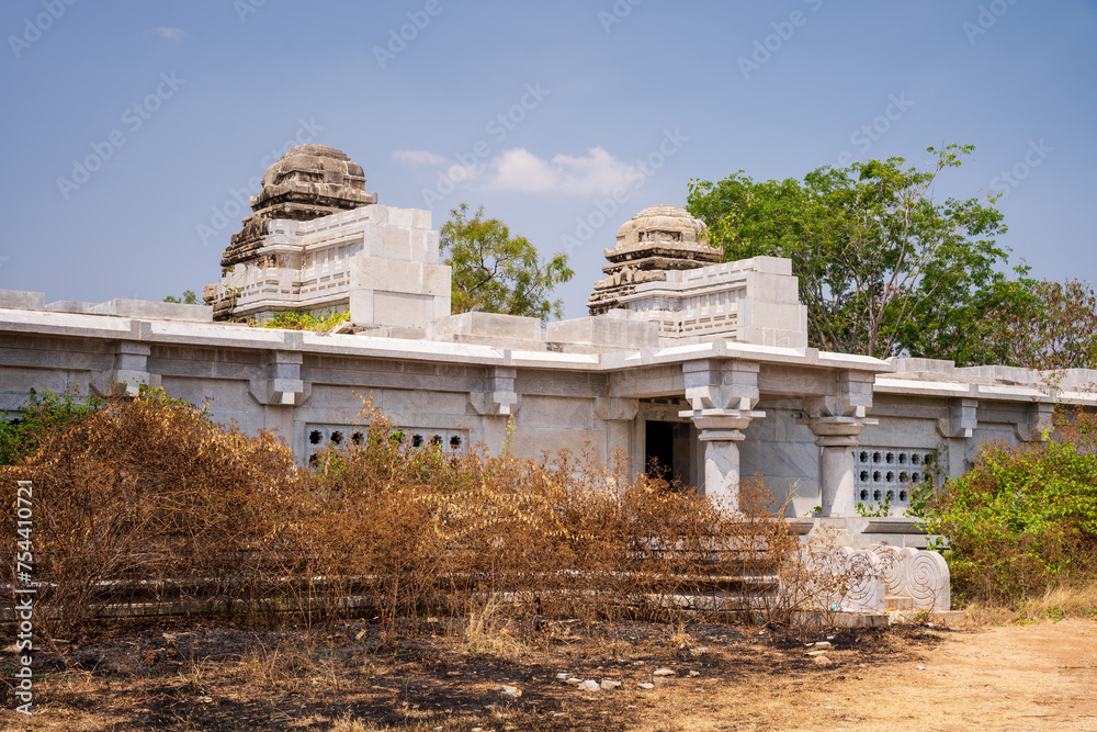 abandoned temple surrounded by green jungle
