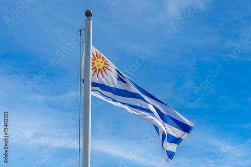 Buenos Aires, Argentina - February 21, 2023: Uruguay flag against the sky