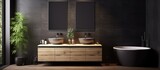 A contemporary bathroom featuring two elegant sinks with mirrors positioned next to a window. A stylish bathtub with a table and plant rests against a wooden wall,