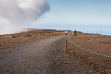 Two people walking on top of Bolafjall mountain in Westfjords, Iceland. Beautiful remote location