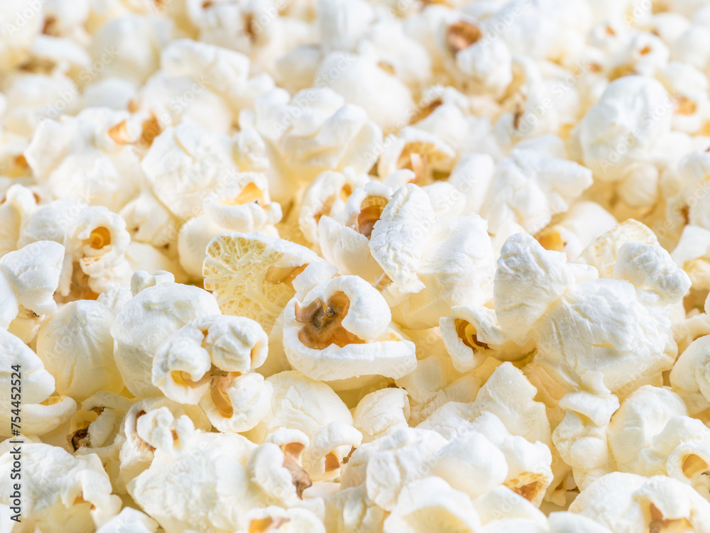 Fresh salted natural popcorn texture background. Close up detail