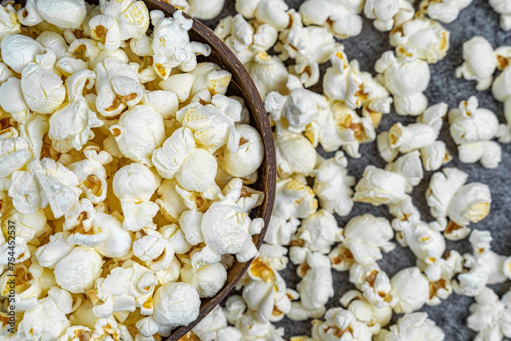 Fresh popcorn snacks in a wooden bowl