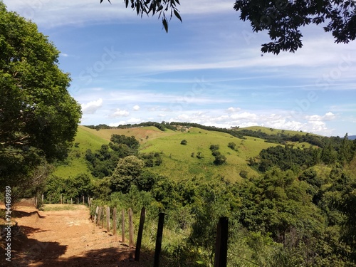 hill with blue sky in the background