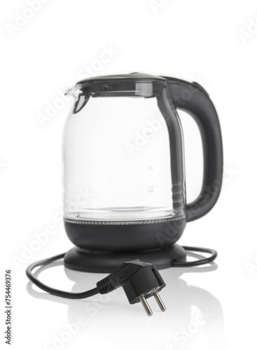 Modern electric kettle with electric cable on a white background. Front focus