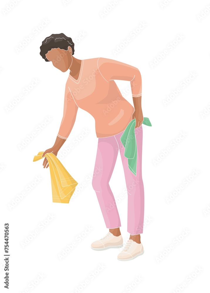 African American woman bent over to put laundry in the washing machine African American woman bent over to put laundry in the washing machine