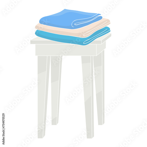 stack of clean towels on a stool	

