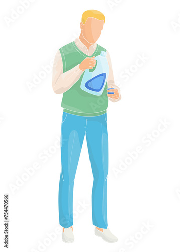  man pouring laundry detergent from bottle into cap	