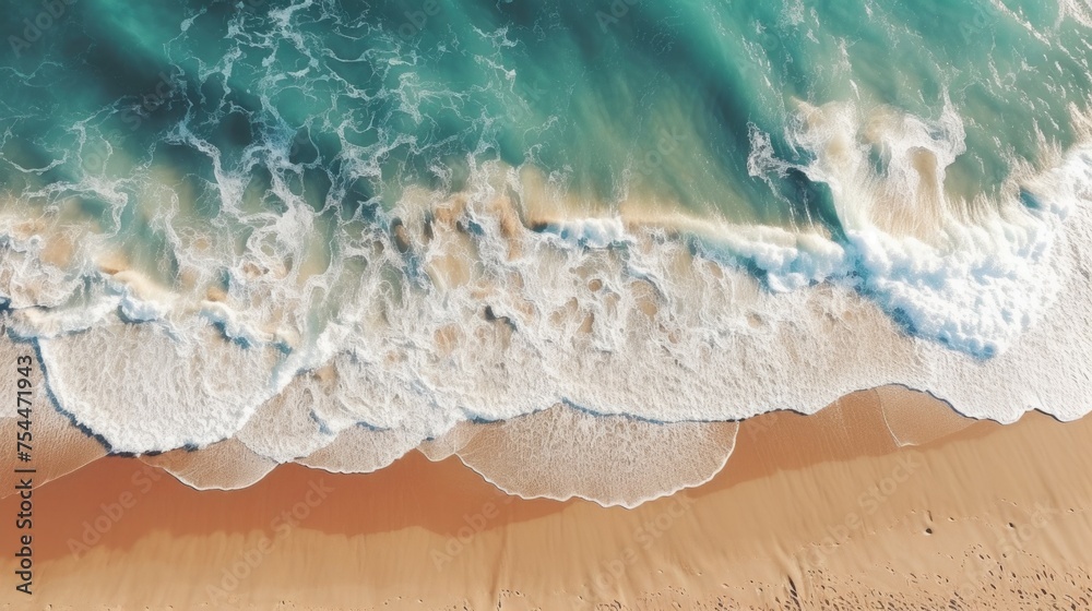 Aerial view of waves crashing on a sandy beach, perfect for travel websites
