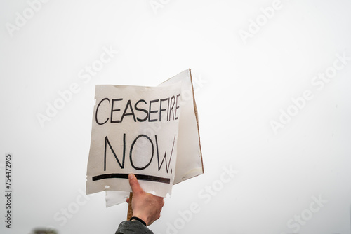 Ceasefire Now. Sign Held Outside