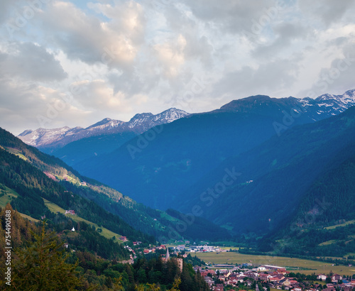 Alps mountains summer view and village in valley (Austria)