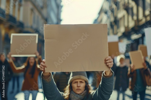 Group of People Holding Up Signs