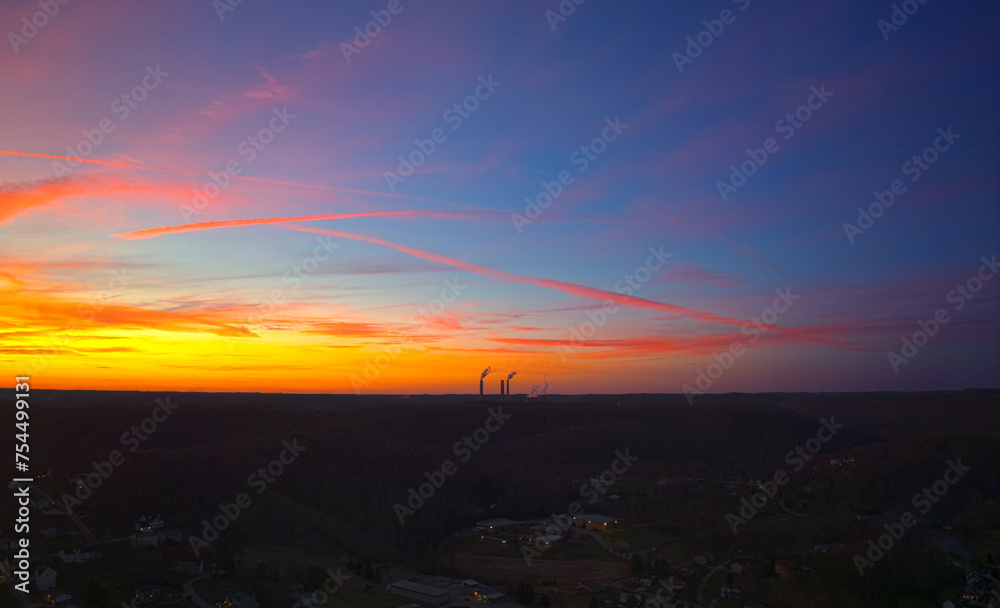 Sunset Over Rural Industrial Landscape