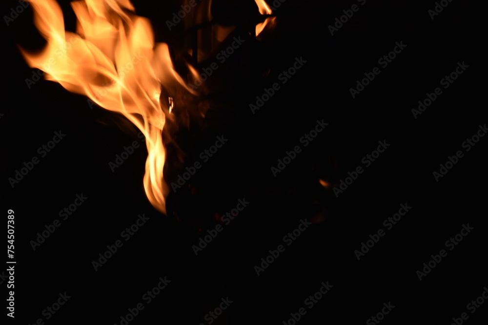 Flames of a coppara torch that lighting in Kandy Esala Perahera at Temple of the Tooth (Sri Dalada Maligawa), Kandy, Sri Lanka. Flames of a coppara torch that lighting in Kandy Esala Perahera at Temple of the Tooth (Sri Dalada Maligawa), Kandy, Sri Lanka.