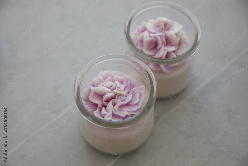 Candles in the form of colorful flowers