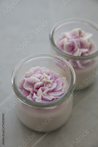 Candles in the form of colorful flowers
