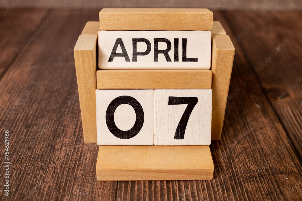 April 07st. Day 07 of month, daily calendar on white table with reflection, April 07st. Day 07 of month, daily calendar on white table with reflection,